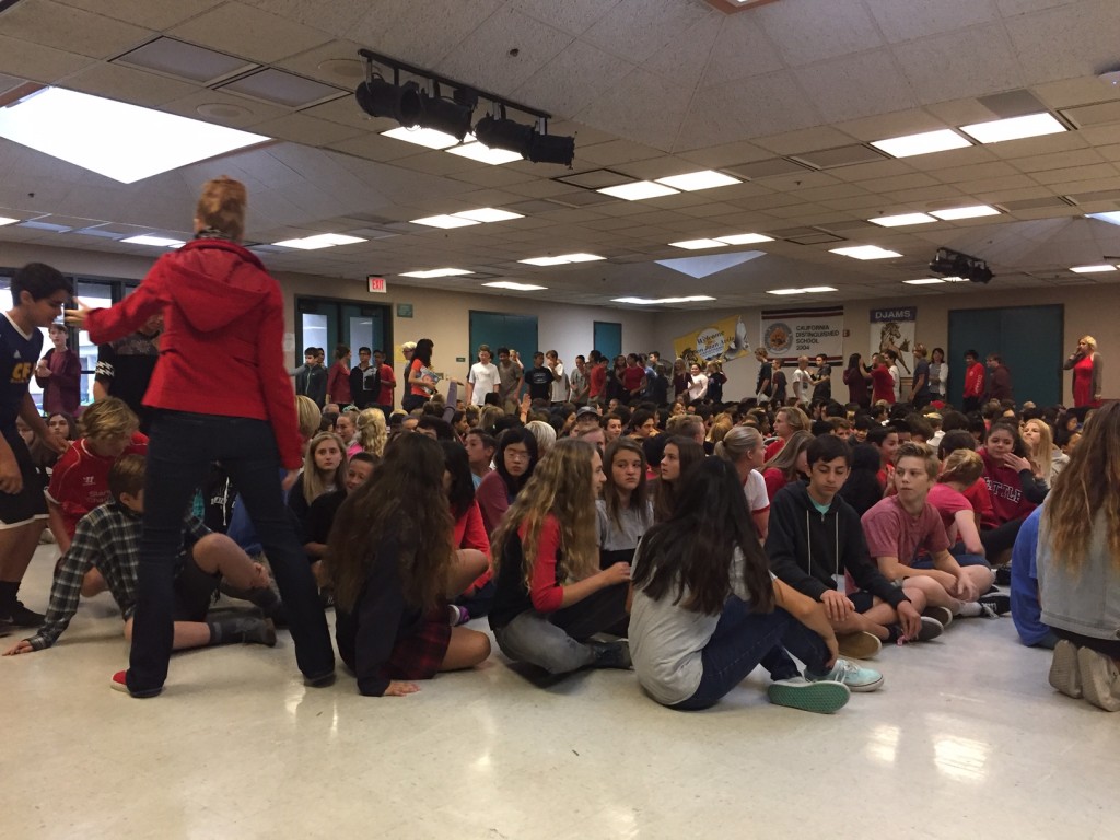 Red Ribbon Week 8th Graders watching Overtaken and listening to Aisha Armer and Jodi Barber